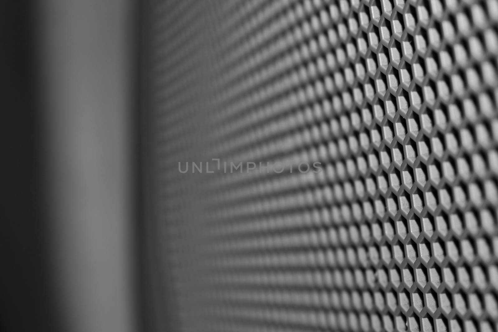 Speaker grid close up by GraffiTimi