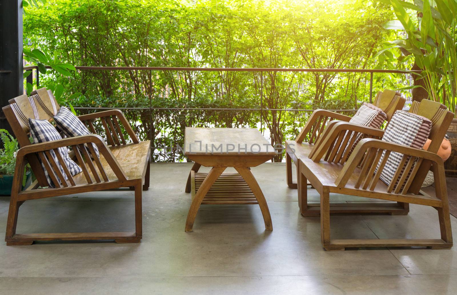 Wooden table and chairs outdoor furniture in the garden for relaxation