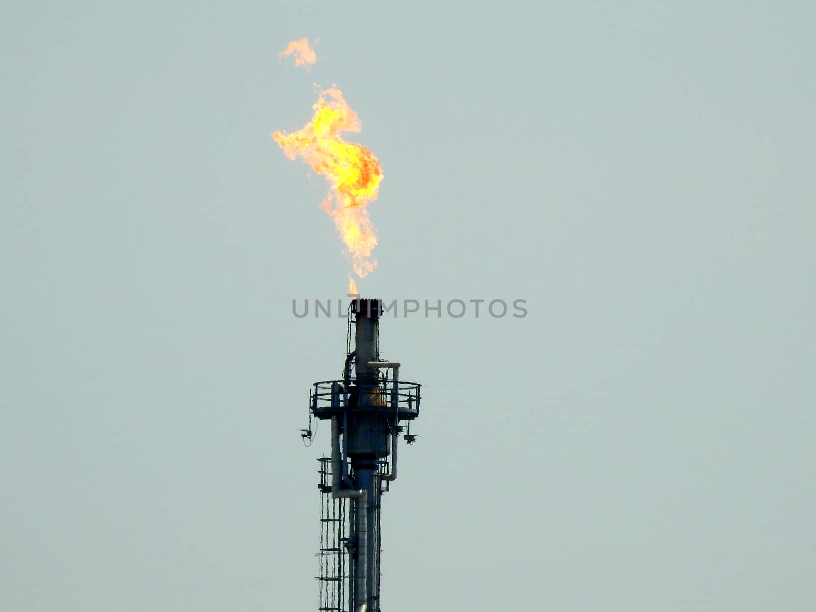 Oil burning against the blue sky in Thailand by pkproject
