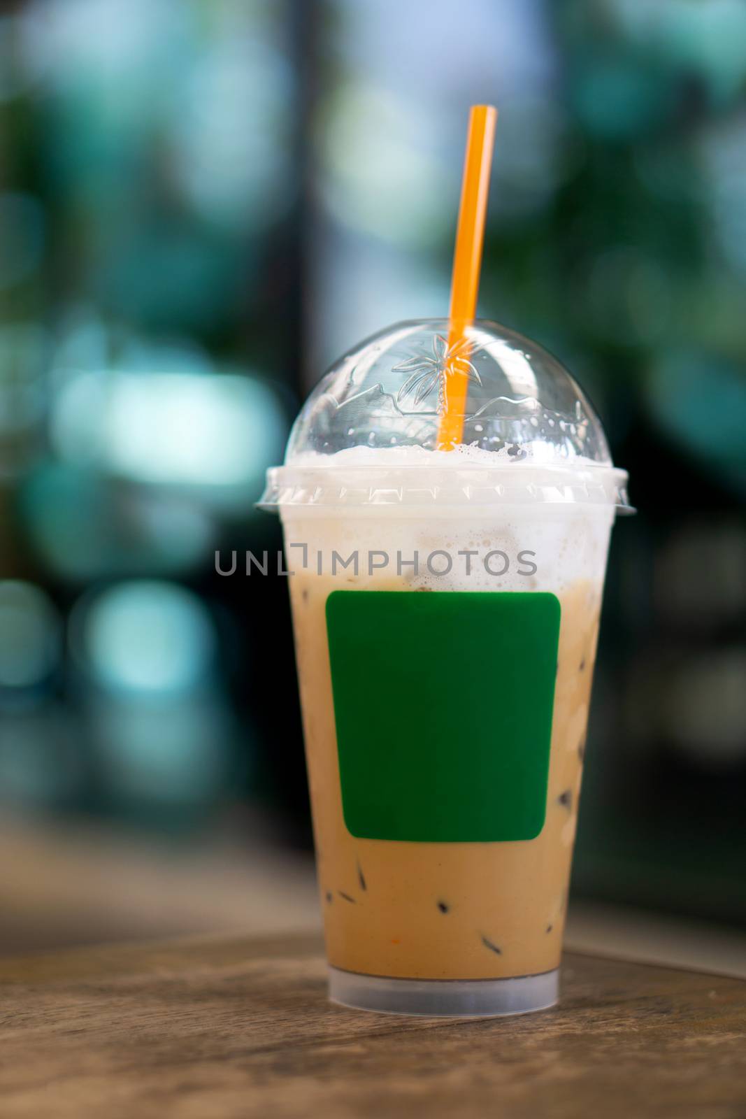 Cappuccino iced Coffee in plastic cup for takeaway mockup template.