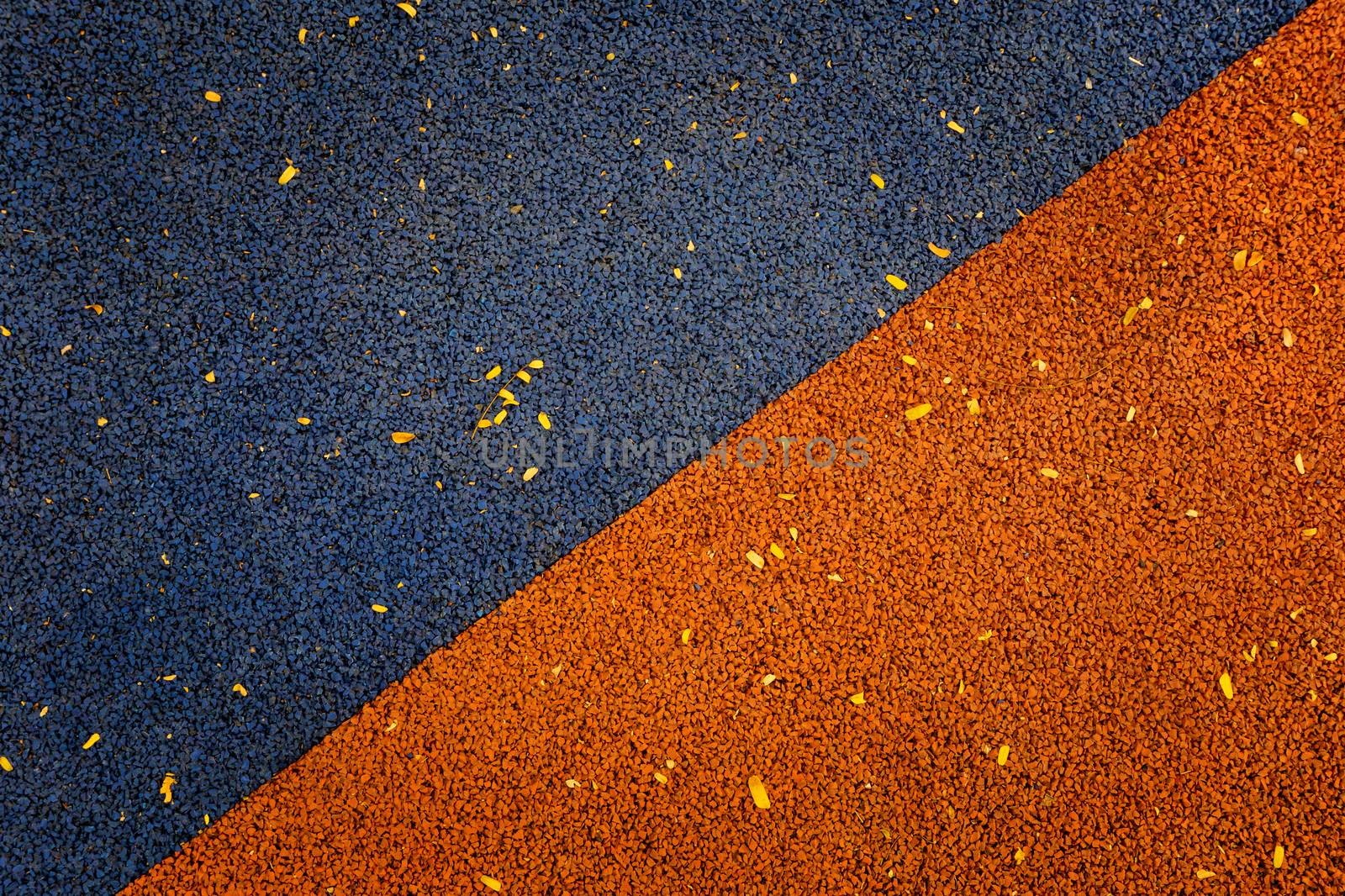 Blue and orange color of Rubber flooring Play park flooring background.