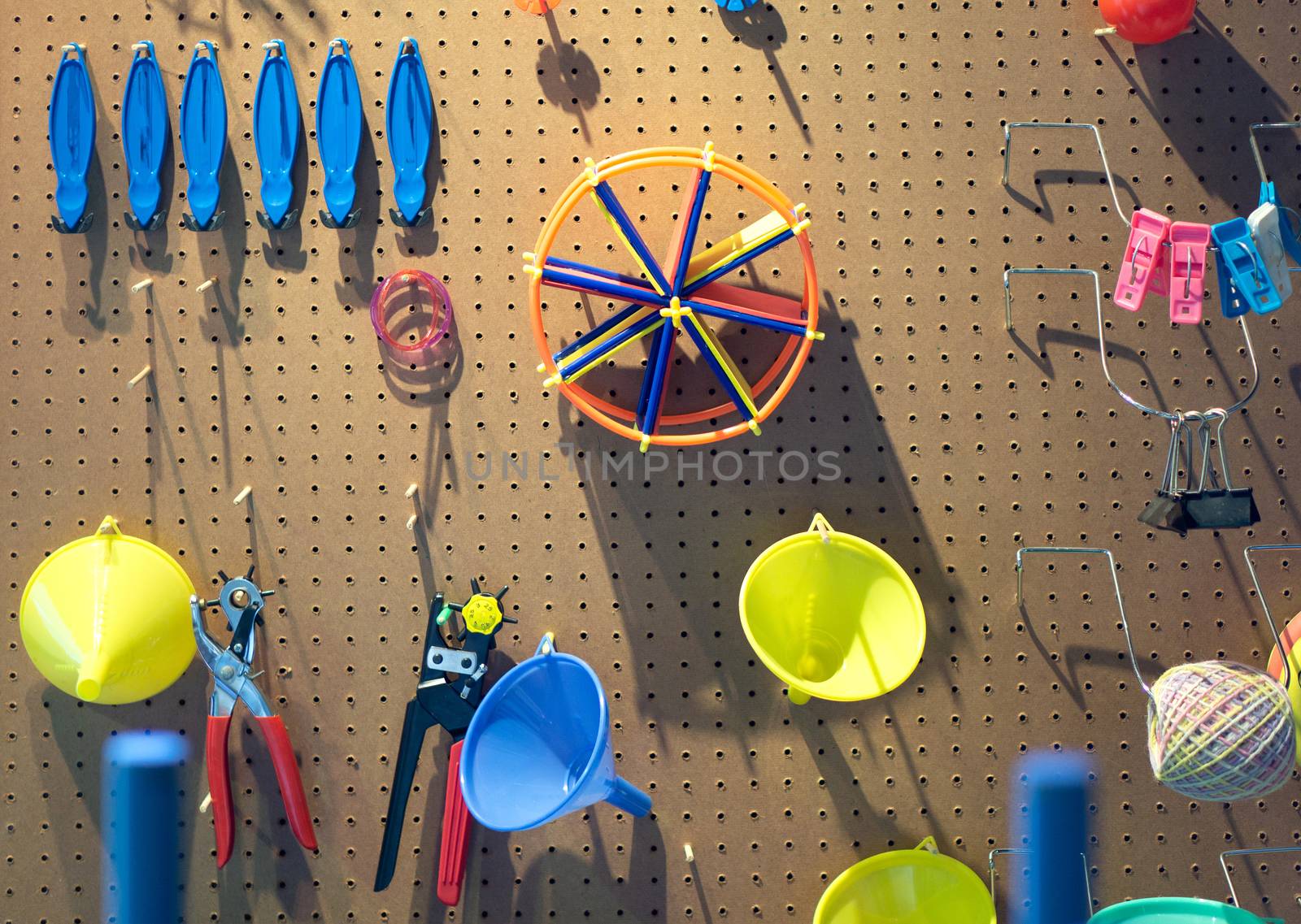 Mixed mechanic and many tools on a wood surface.