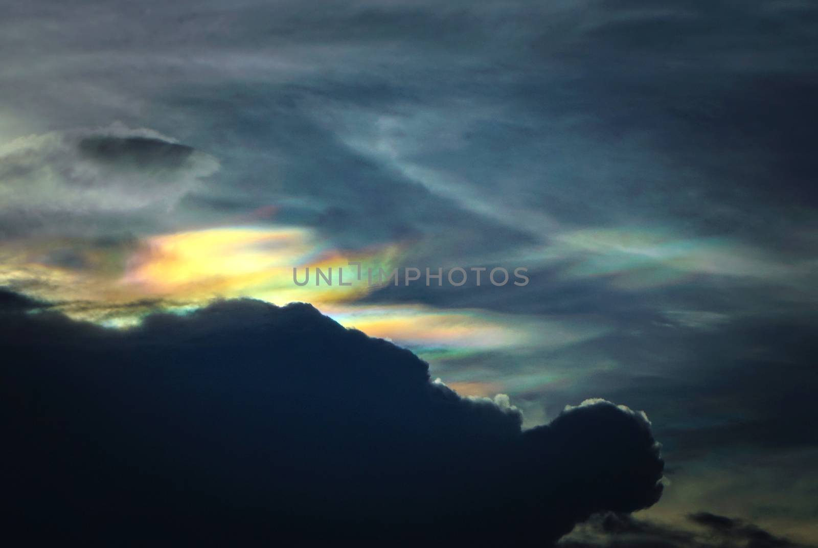Cloud iridescence or irisation is a colorful optical phenomenon that occurs in a cloud and appears in the general proximity of the Sun or Moon.