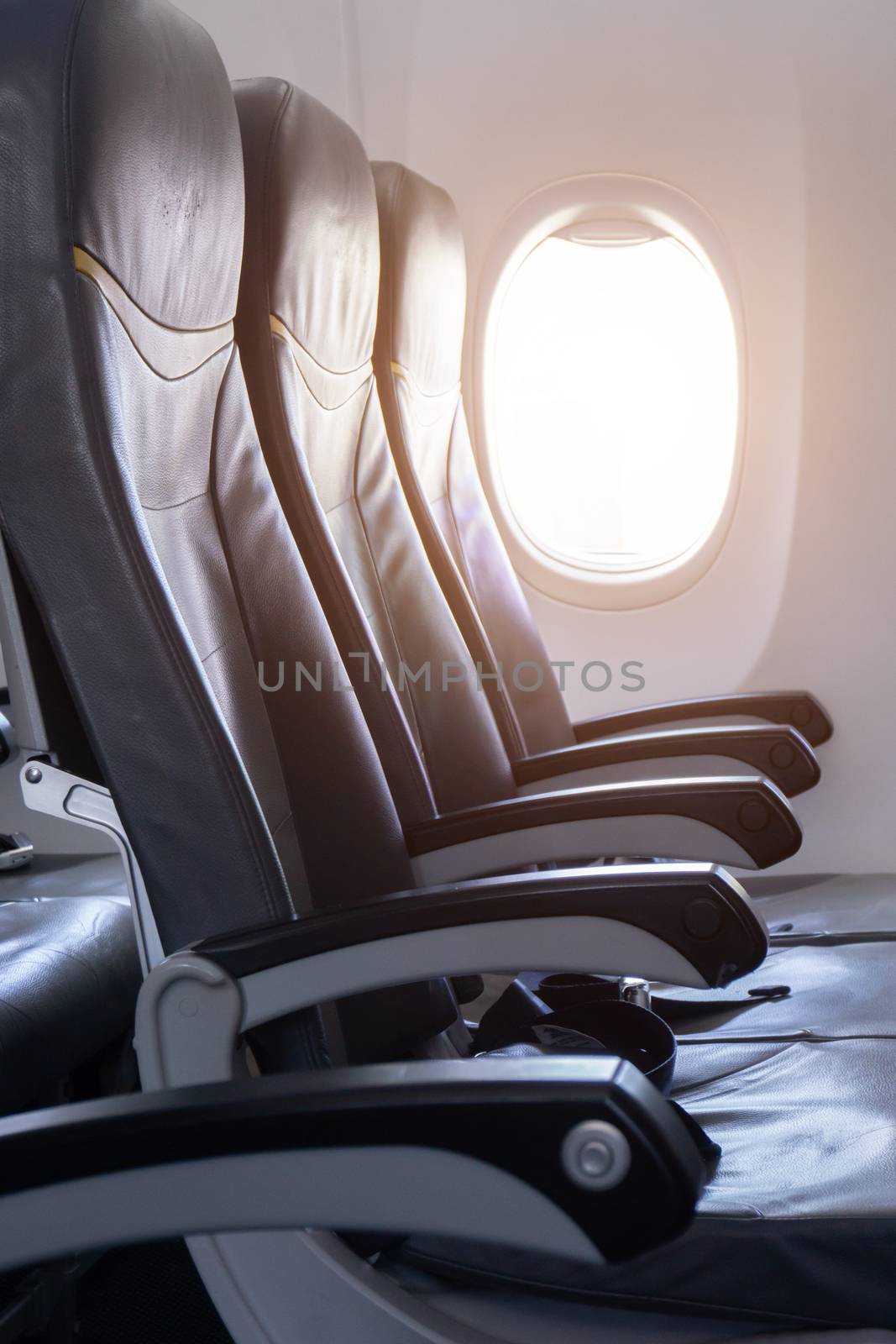 Side view of empty airplane seat In the airplane before take off by pkproject