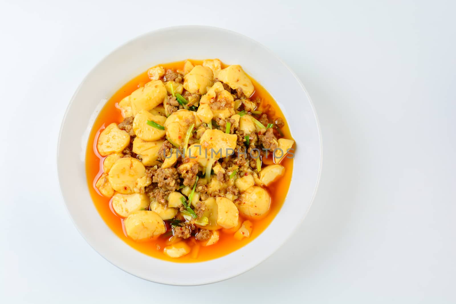 Mapo Tofu, popular Chinese dish.  The classic recipe consists of silken tofu, ground pork or beef and Sichuan peppercorn to name a few main ingredients.
