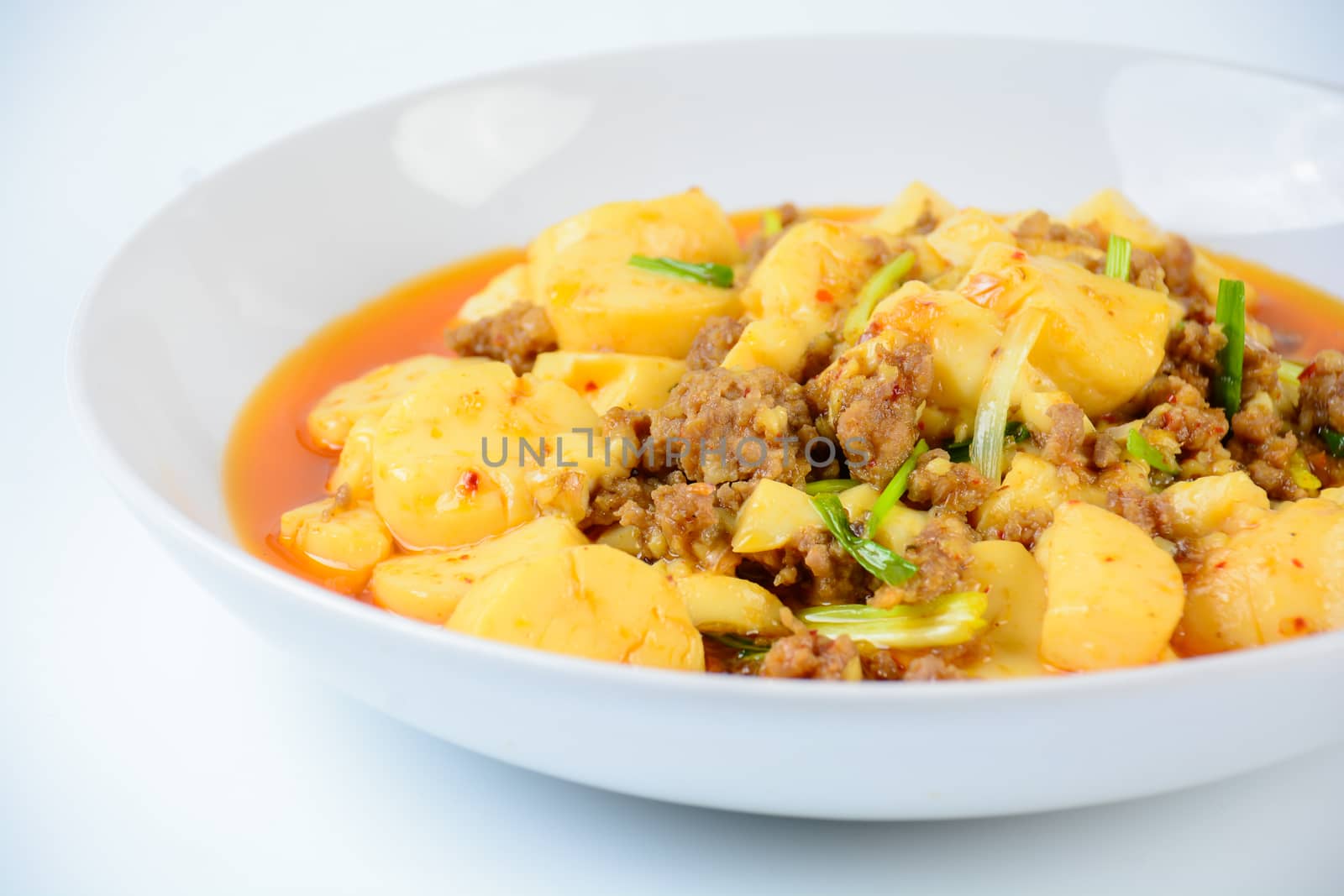 Mapo Tofu, popular Chinese dish.  The classic recipe consists of silken tofu, ground pork or beef and Sichuan peppercorn to name a few main ingredients.
