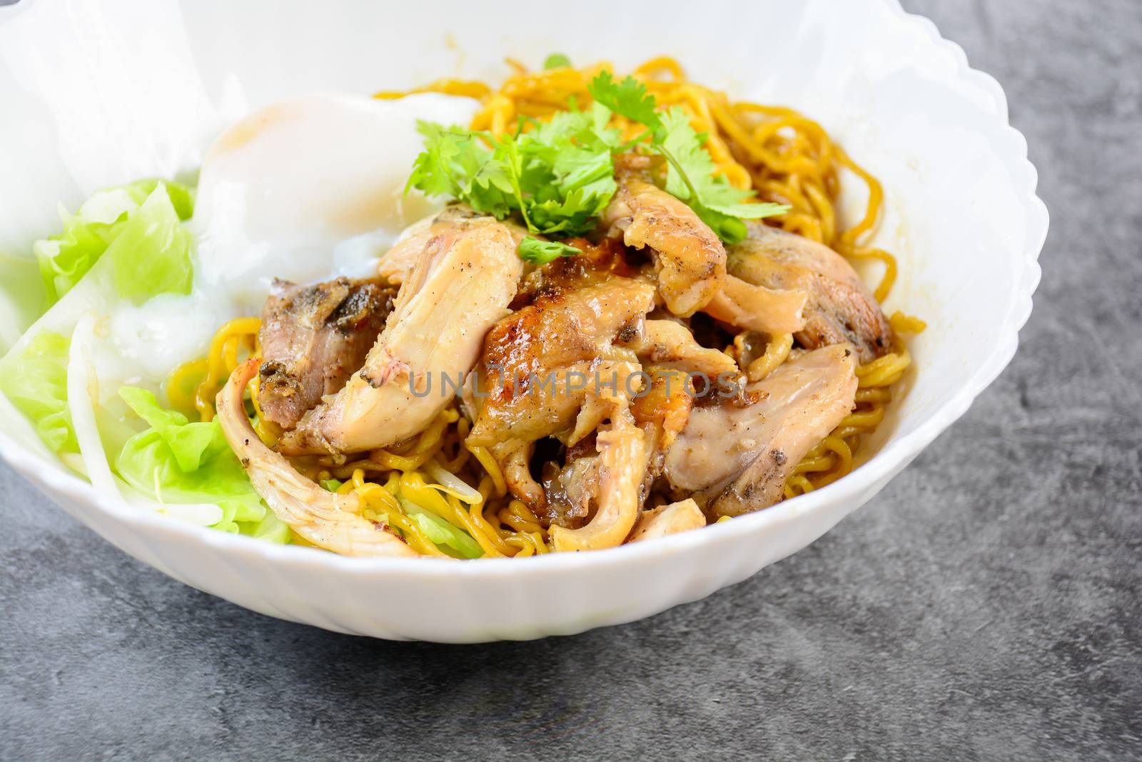 Egg noodles served dry with roasted honey chicken and soft-boile by yuiyuize