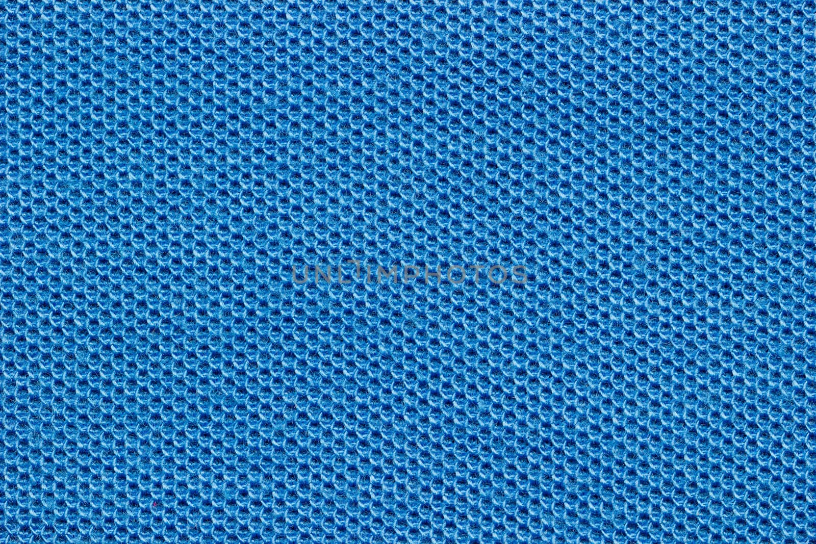 Texture of blue shirt fabric. Concept of clothes or fashion.