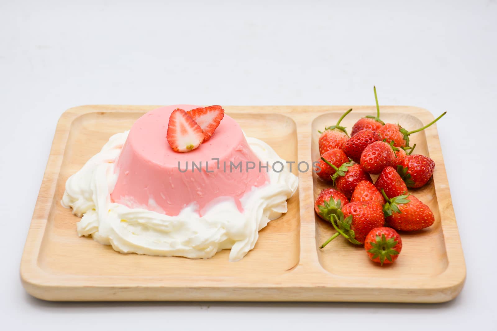 Italian dessert Pana Cotta with strawberries by yuiyuize