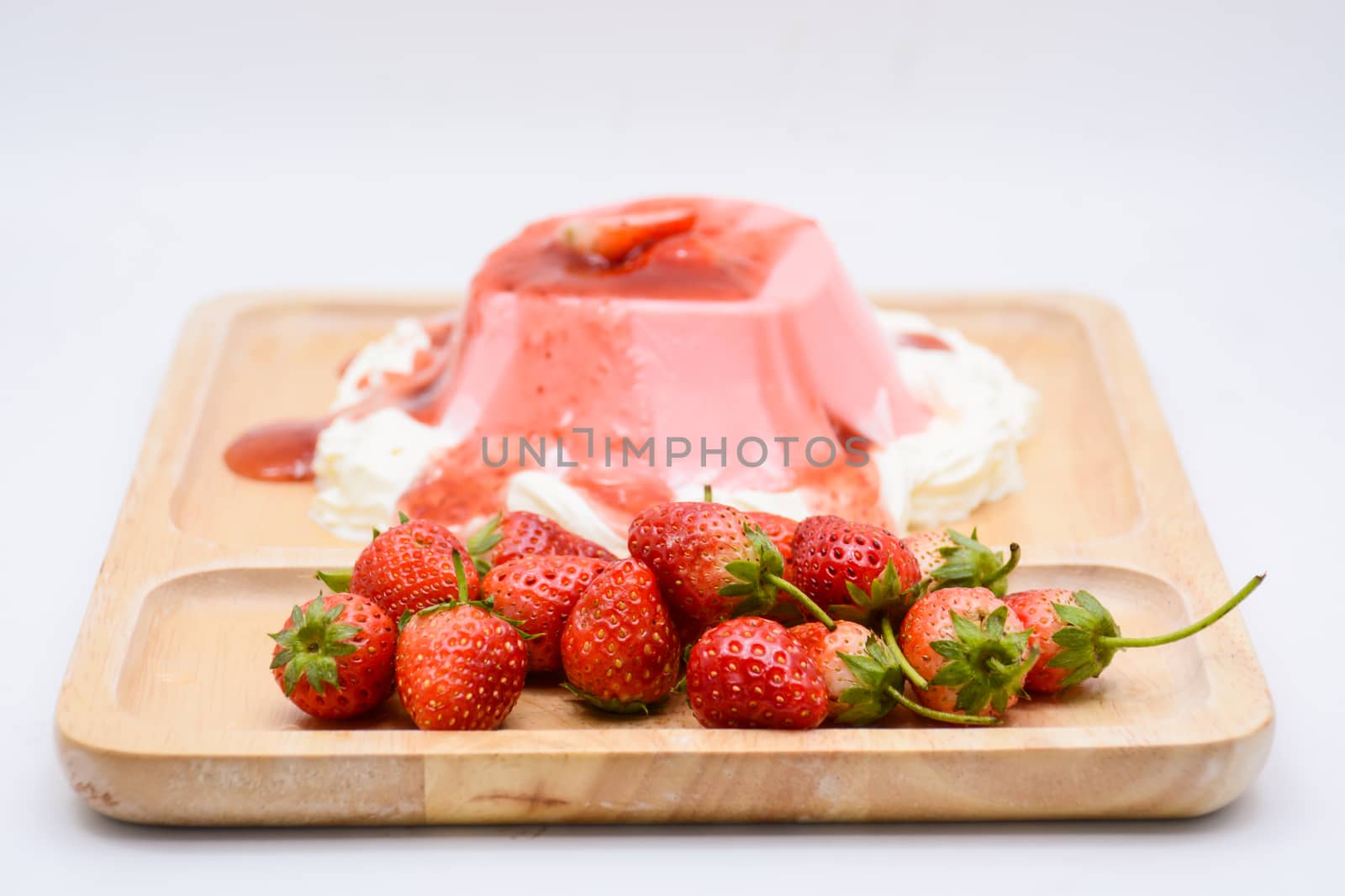 Italian dessert Pana Cotta with strawberries by yuiyuize