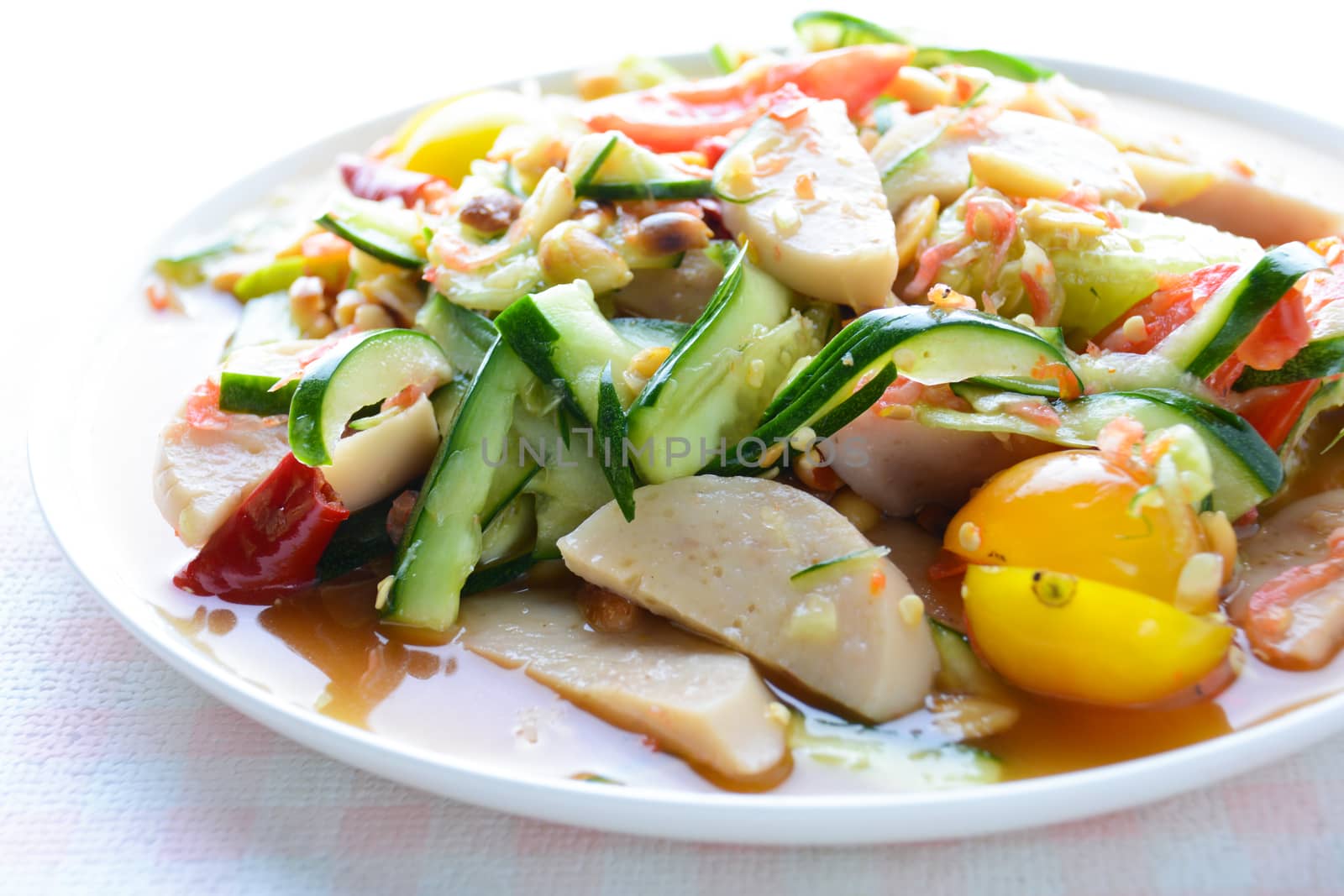 Cucumber salad with preserved pork sausages, Thai popular food c by yuiyuize