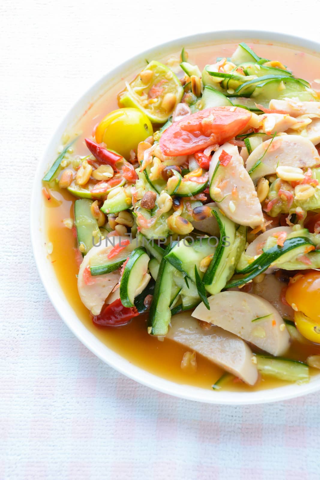 Cucumber salad with preserved pork sausages, Thai popular food c by yuiyuize