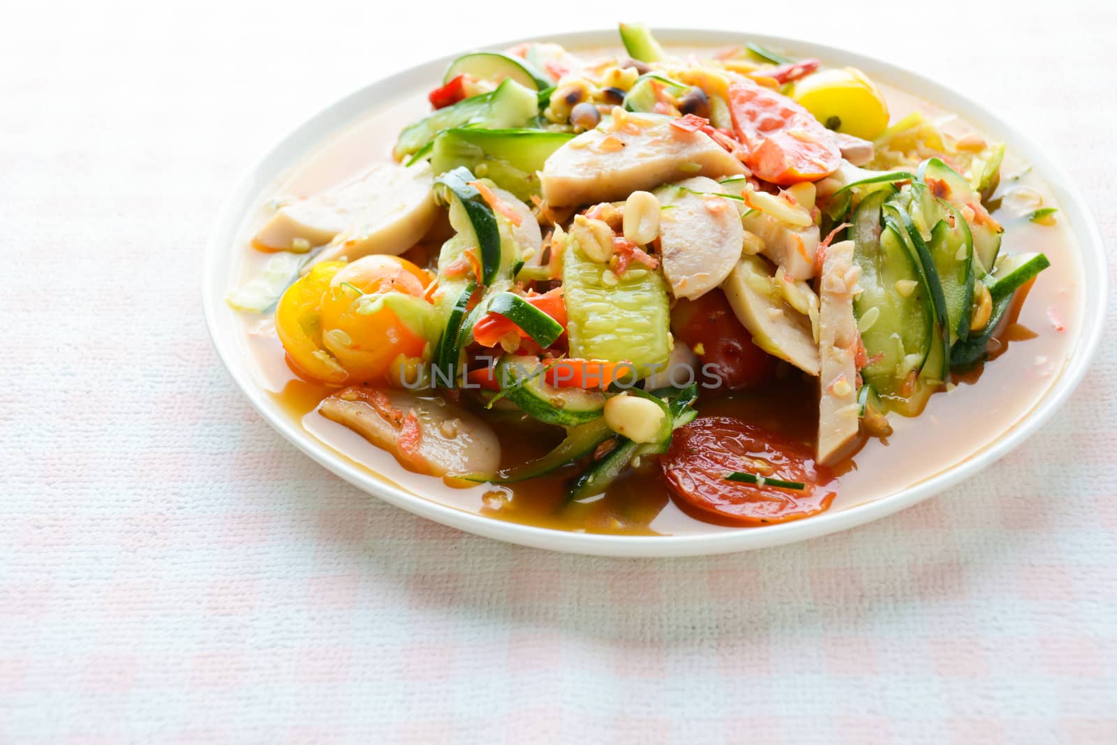 Cucumber salad with preserved pork sausages, Thai popular food c by yuiyuize