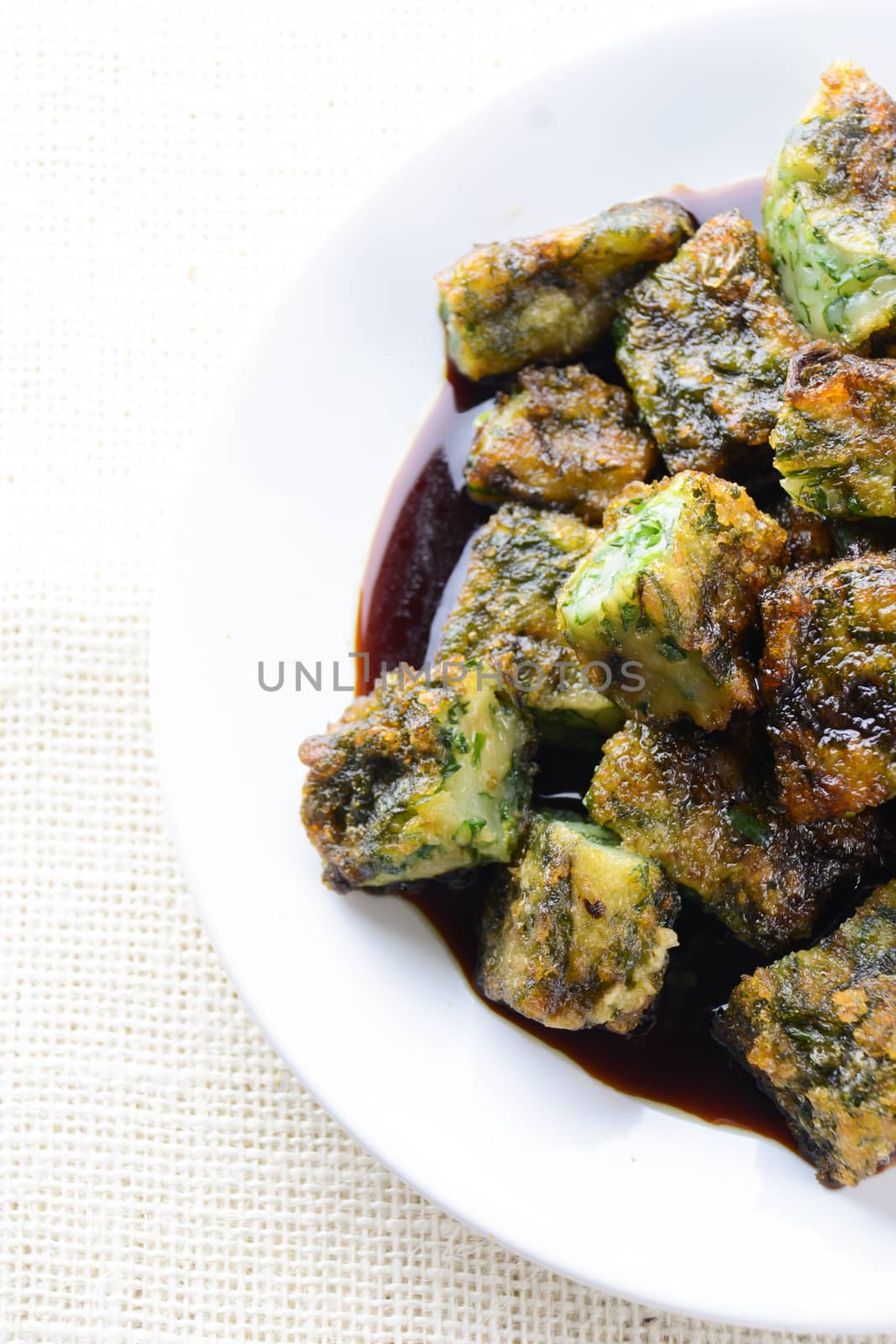 Deep fried Chinese Chive Dumplings (Kanom Gui Chai or Ku Chai Kuih), make for a great healthy and light snack/appetizer, and consisting of chinese chives stuffed inside dumpling dough.