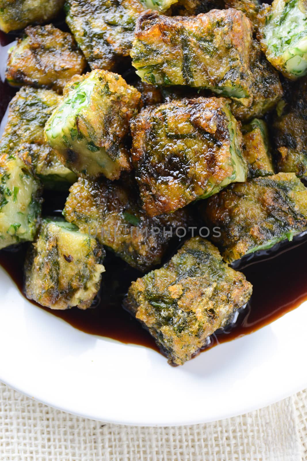 Deep fried Chinese Chive Dumplings (Kanom Gui Chai or Ku Chai Kuih), make for a great healthy and light snack/appetizer, and consisting of chinese chives stuffed inside dumpling dough.