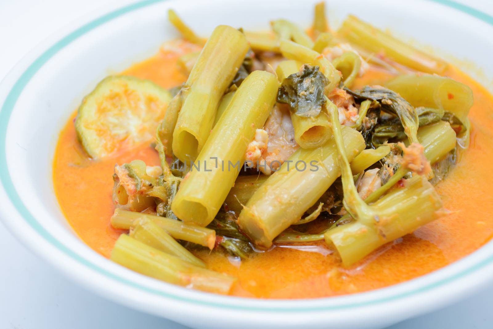 Red Curry with Pork Belly and Water Spinach (Gang Tay Po), a coconut milk curry with sweet, sour and mellow flavor. And smell good from kaffir lime. Eat with hot steamed rice is so delicious.