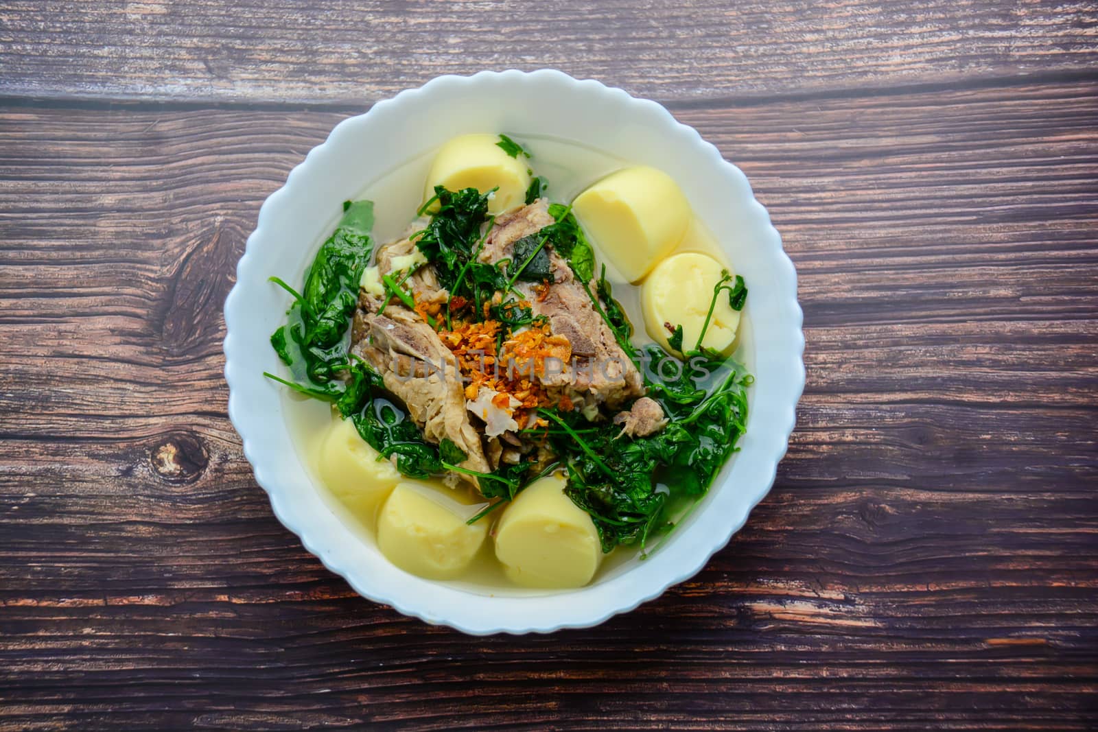 Ivy gourd soup with Soft white bean curd and pork bone
