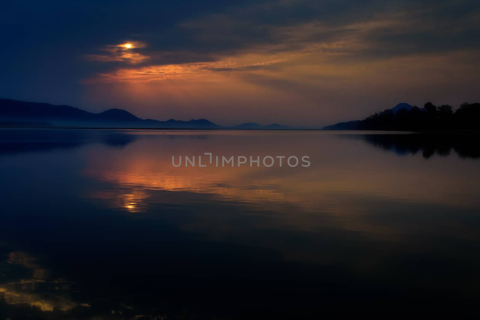 Sunrise over Mahanadi river, Odisha, Eastern Ghat mountain range, copy space