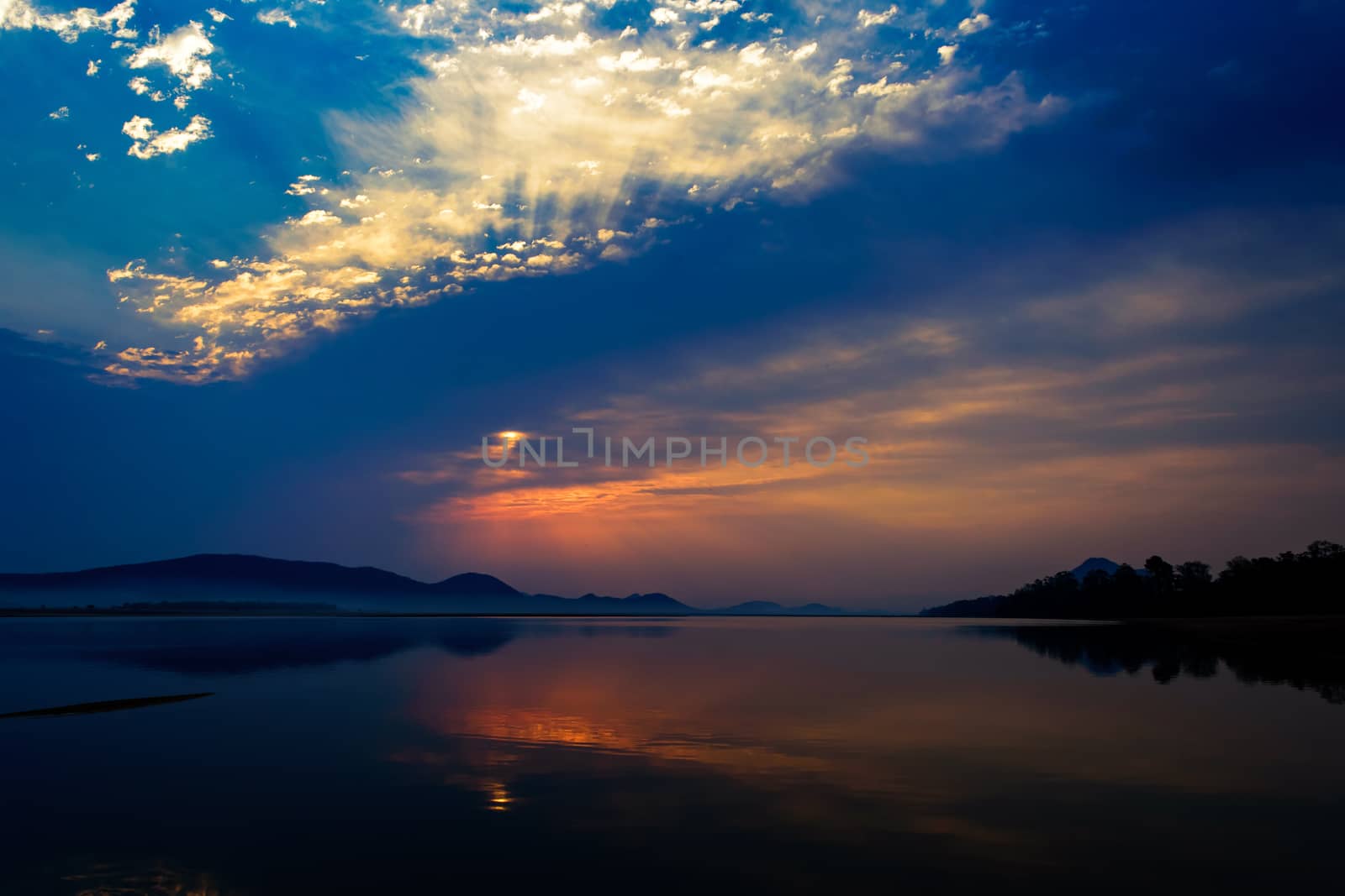 Sunrise over Mahanadi river, Odisha, Eastern Ghat mountain range, copy space