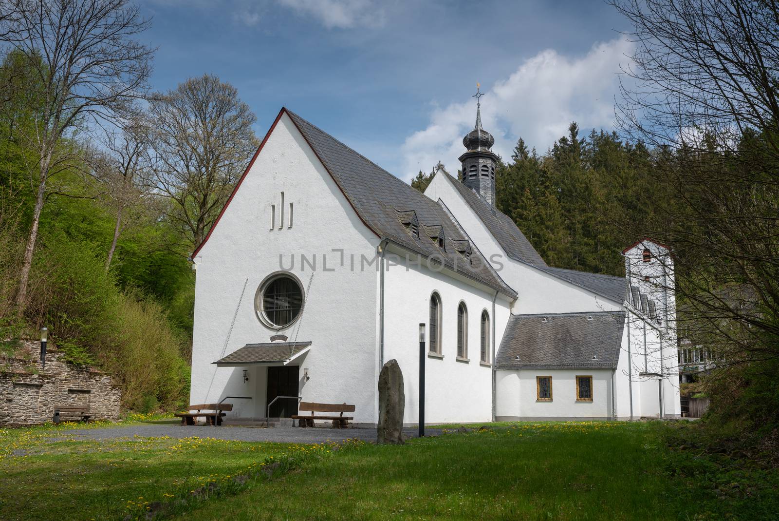 Panoramic image of the pilgrimage church of monastery Maria Martental close to Cochem on a sunny day, Germany