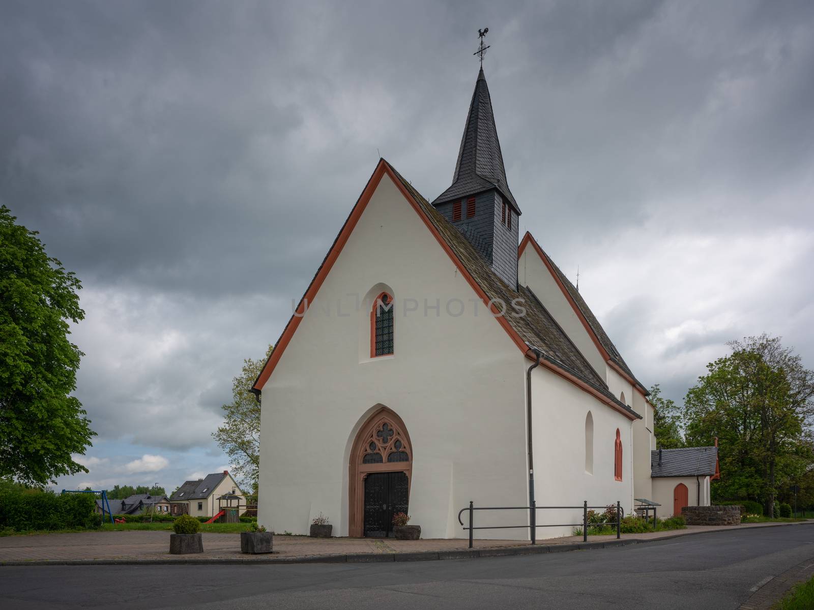 Panoramic image of the pilgrim church Maria and Maria Magdalena of Valwigerberg with cloudy sky, Cochem, Germany