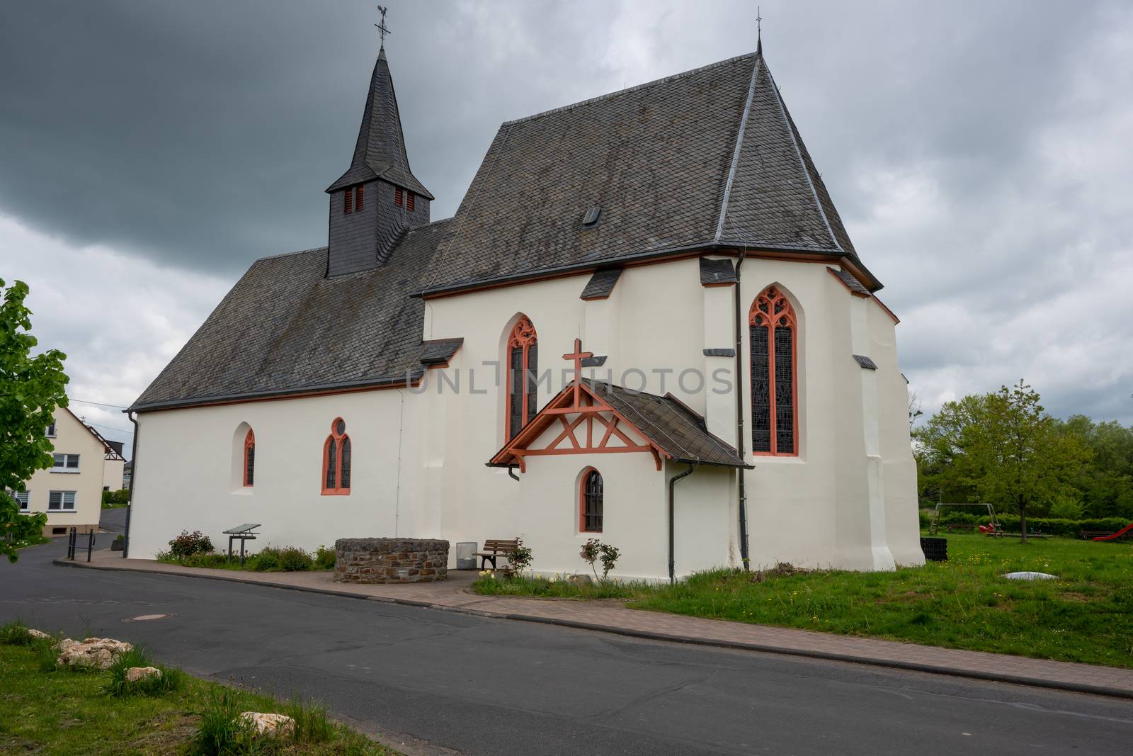 Panoramic image of the pilgrim church Maria and Maria Magdalena of Valwigerberg with cloudy sky, Cochem, Germany