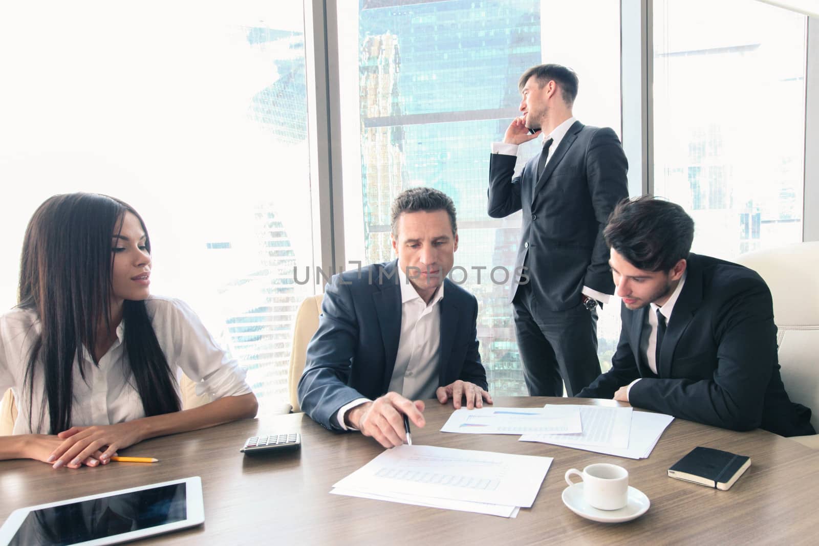 Business people working together at a meeting in modern office