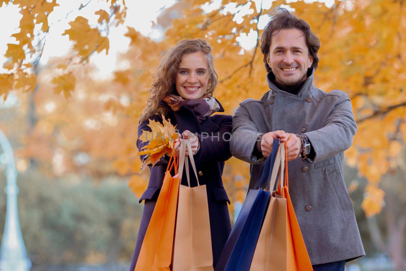 Couple with shopping bags by ALotOfPeople