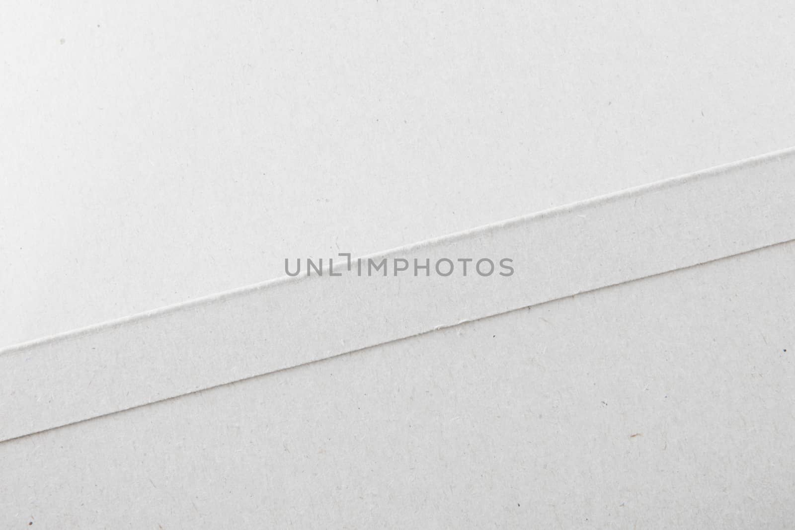 Close-Up Of White Cardboard Texture Background by nenovbrothers