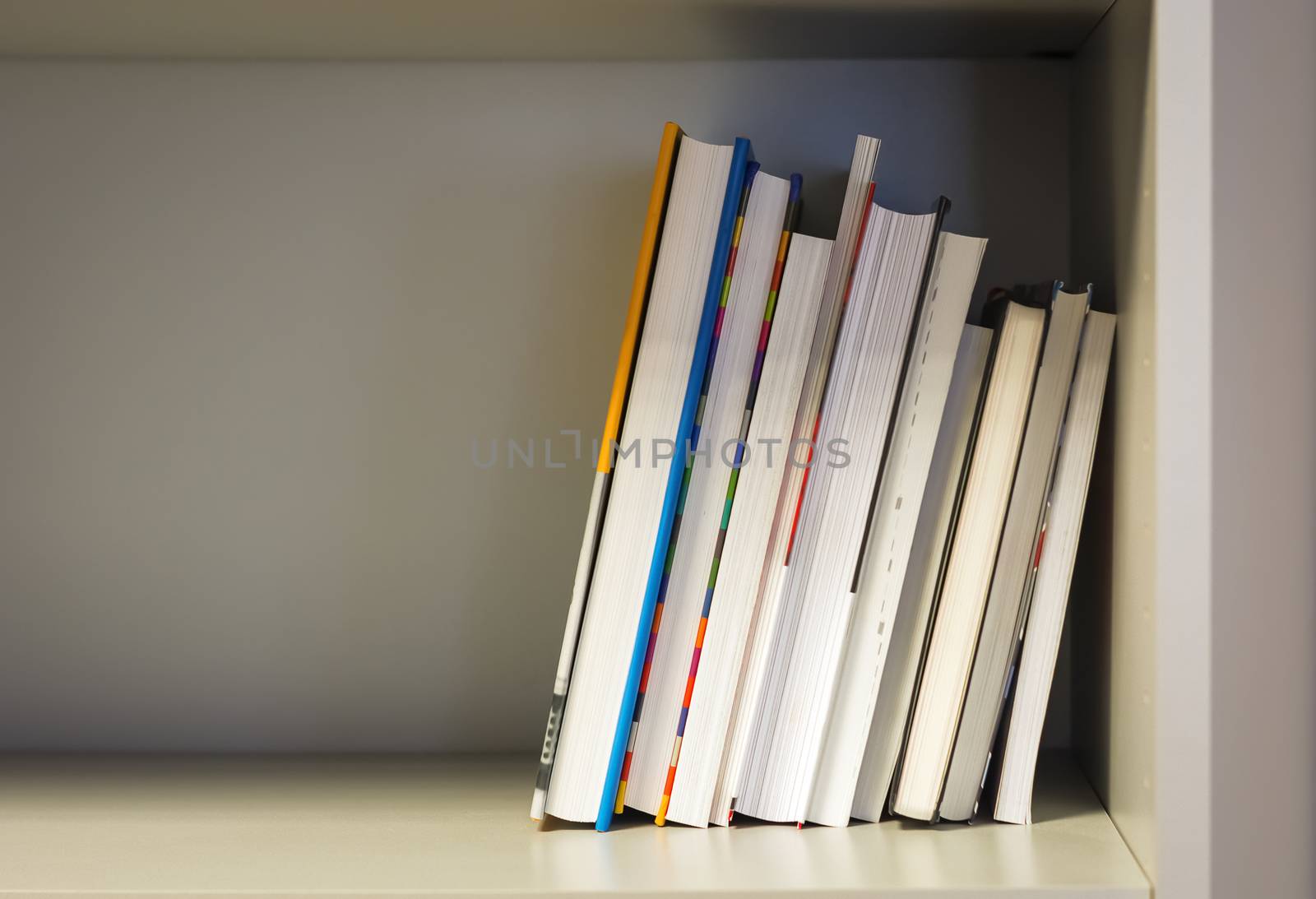 books on a shelf of a library