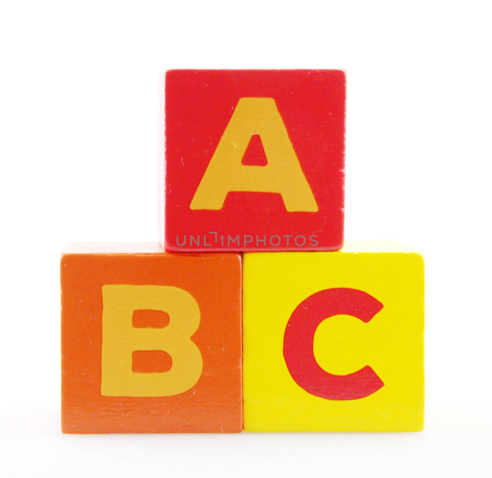 Wooden Alphabet Blocks Against White Background