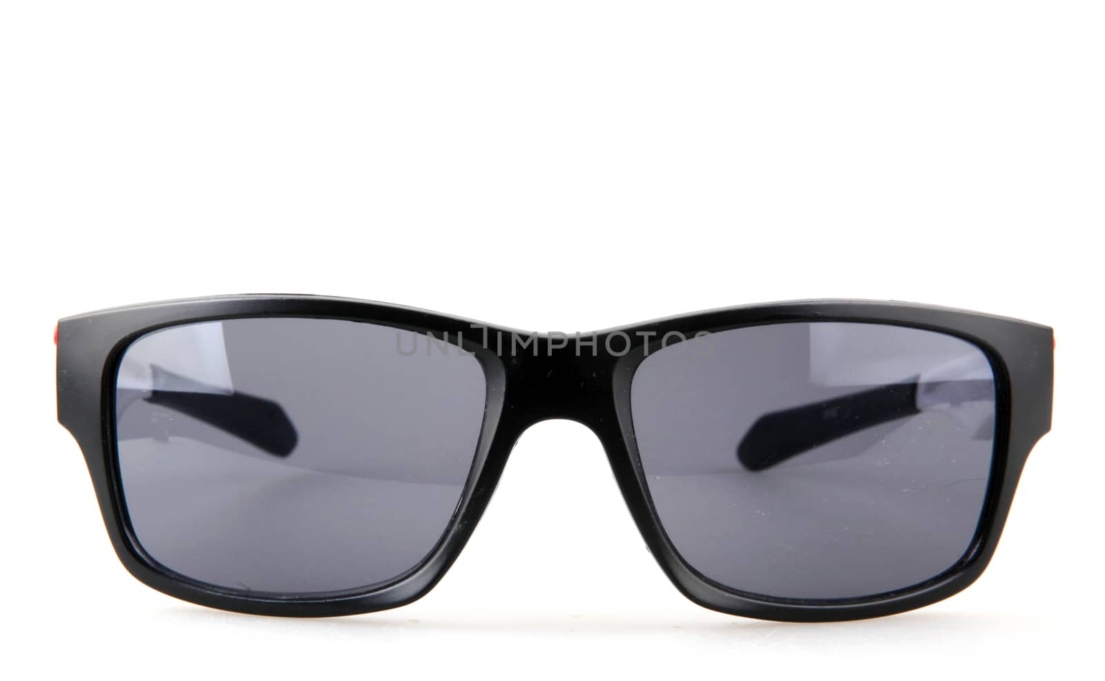 Close-Up Of Sunglasses Against White Background by nenovbrothers