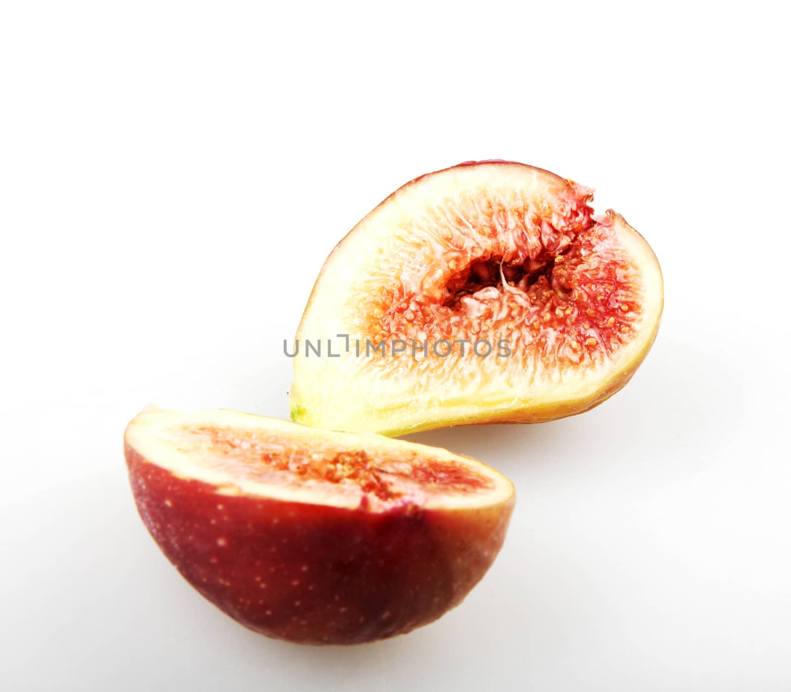 Close-Up Of Fig Against White Background 