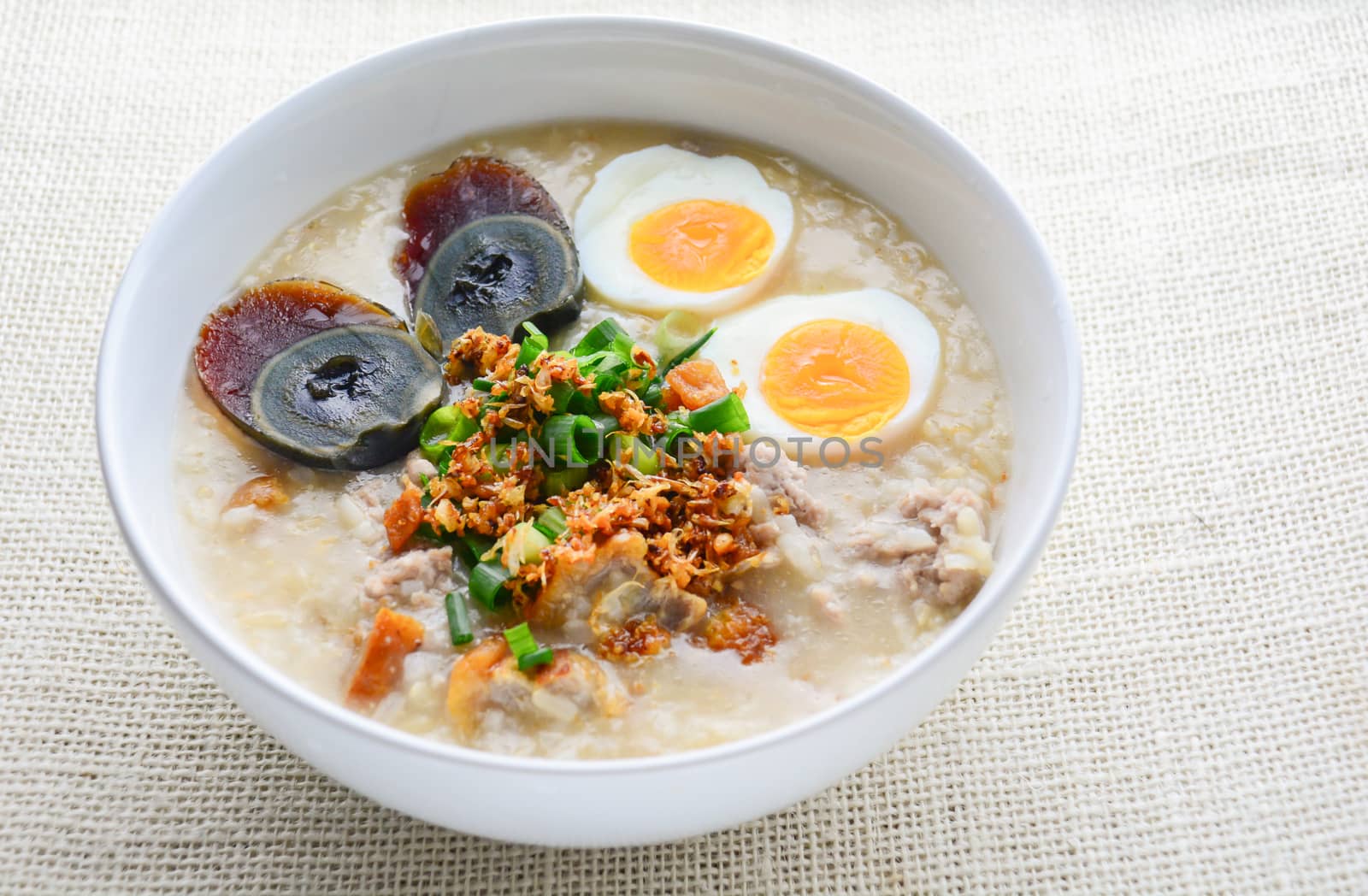 Congee, Rice porridge with minced pork, boiled egg and century egg, great for breakfast.