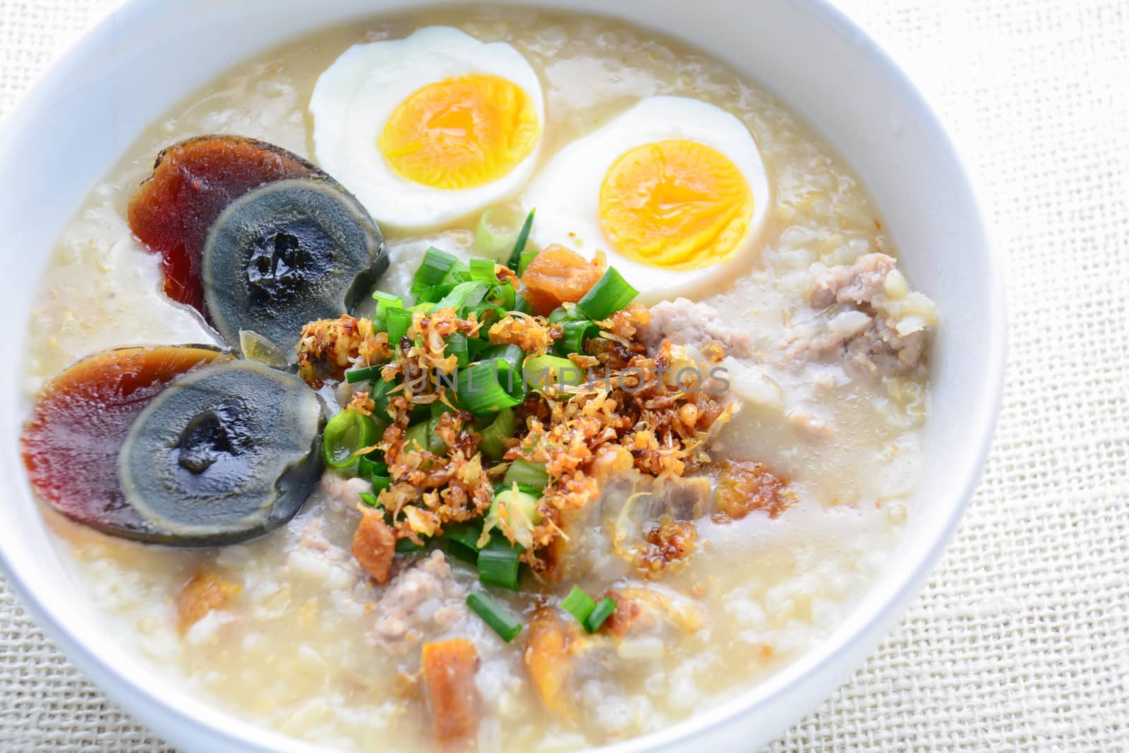 Congee, Rice porridge with minced pork, boiled egg and century egg, great for breakfast.