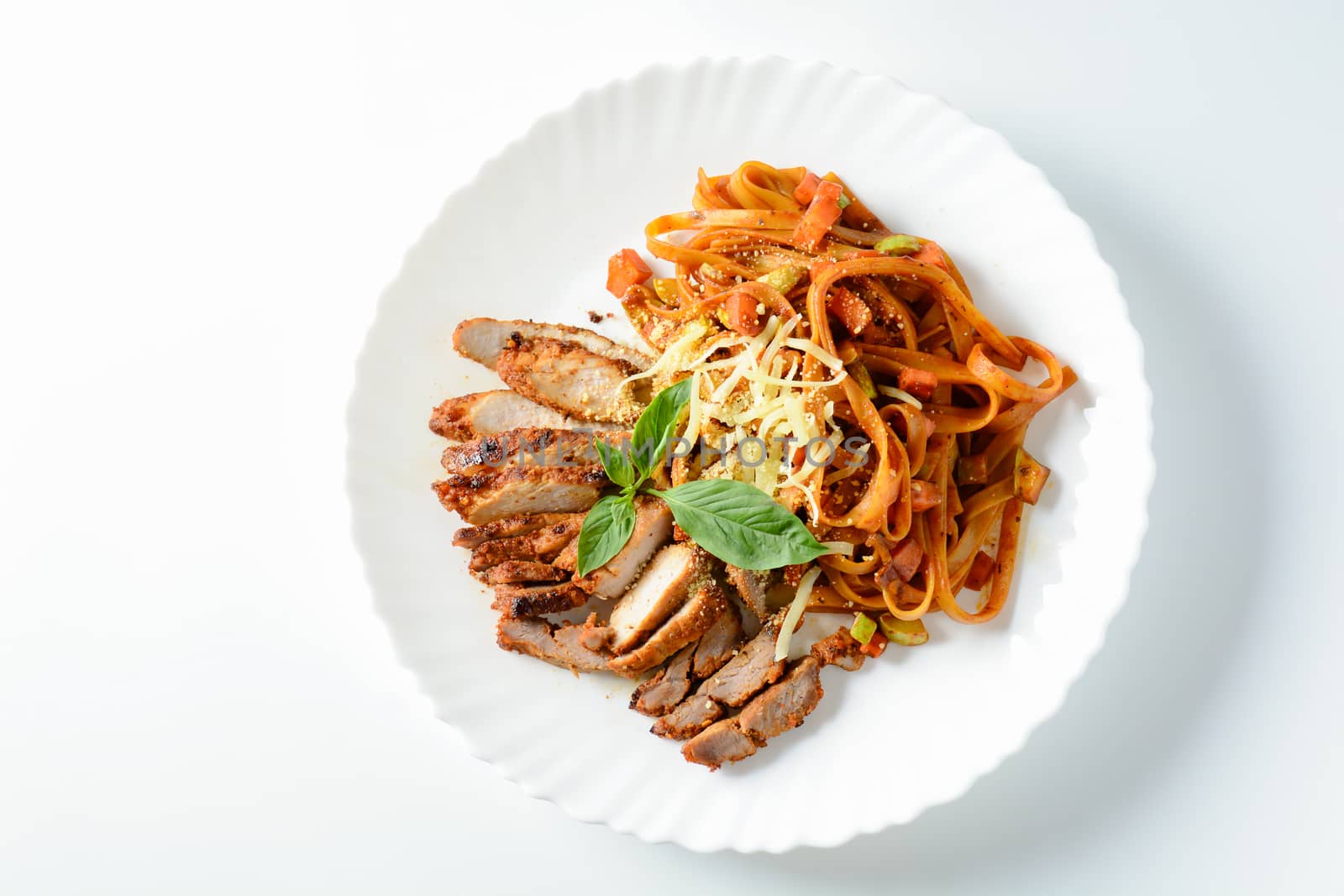 Steak meat with spaghetti and cheese on white background. by yuiyuize