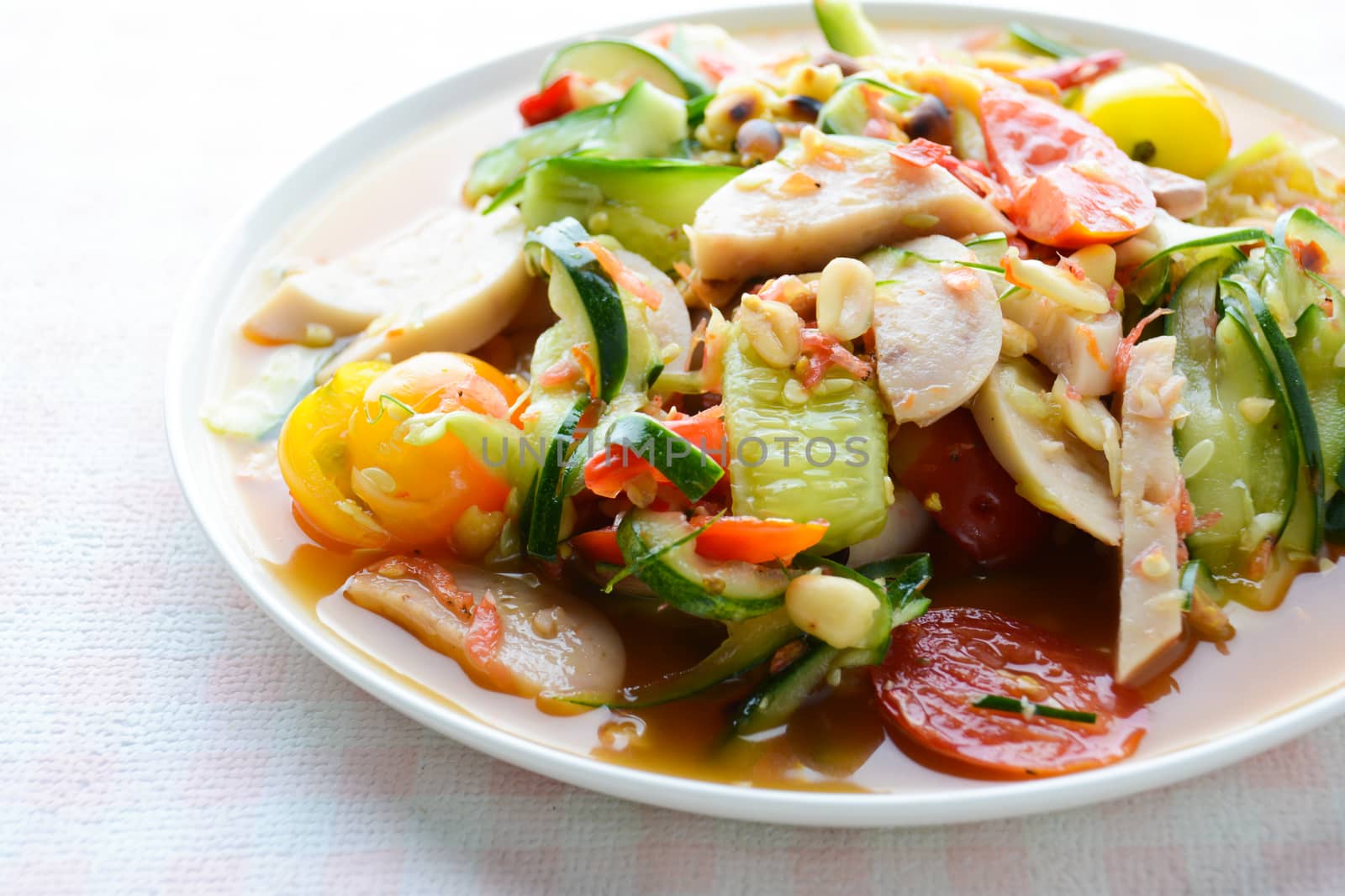 Cucumber salad with preserved pork sausages, Thai popular food c by yuiyuize