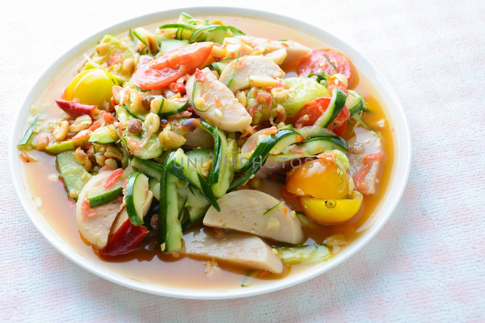 Cucumber salad with preserved pork sausages, Thai popular food c by yuiyuize