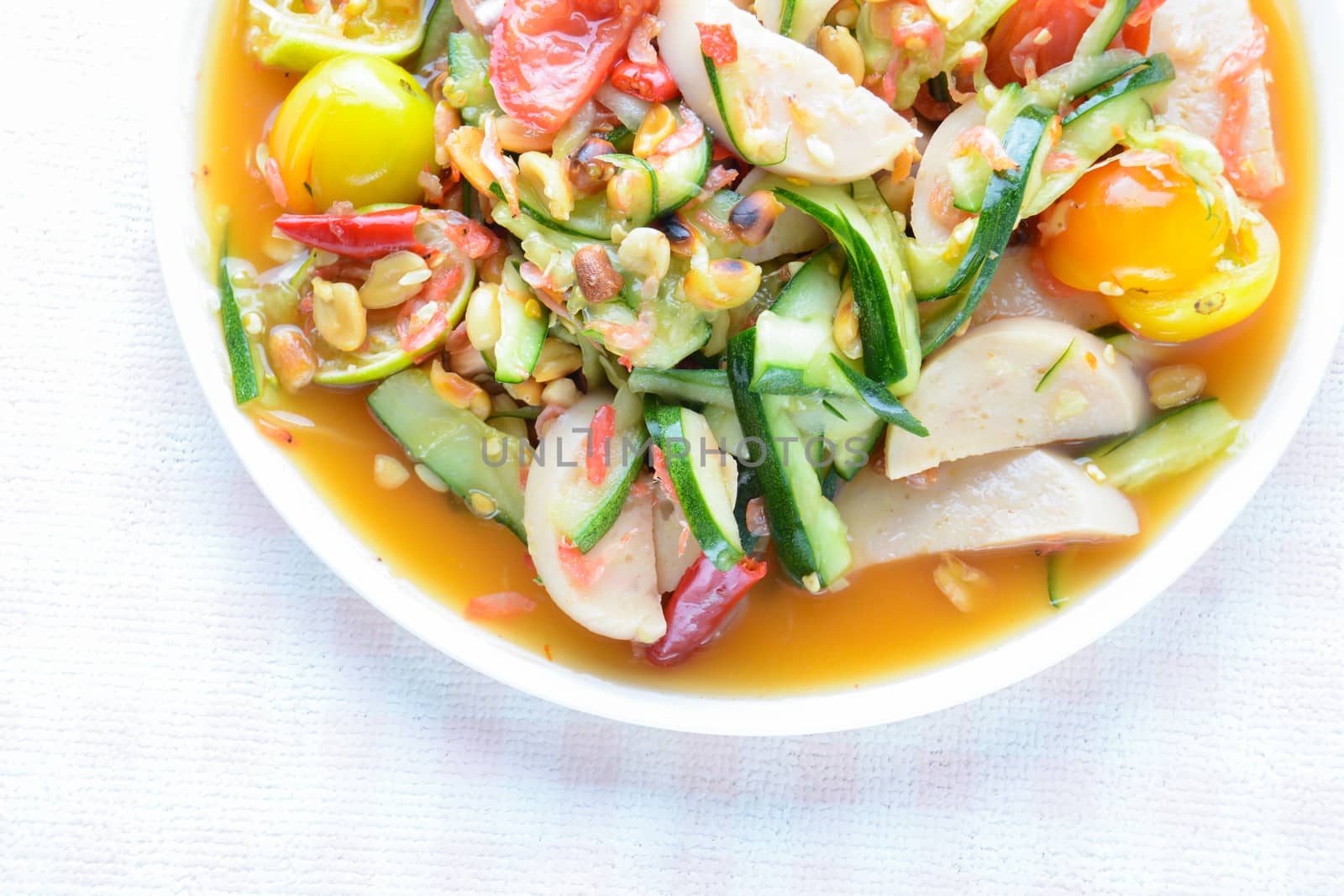 Cucumber salad with preserved pork sausages, Thai popular food c by yuiyuize