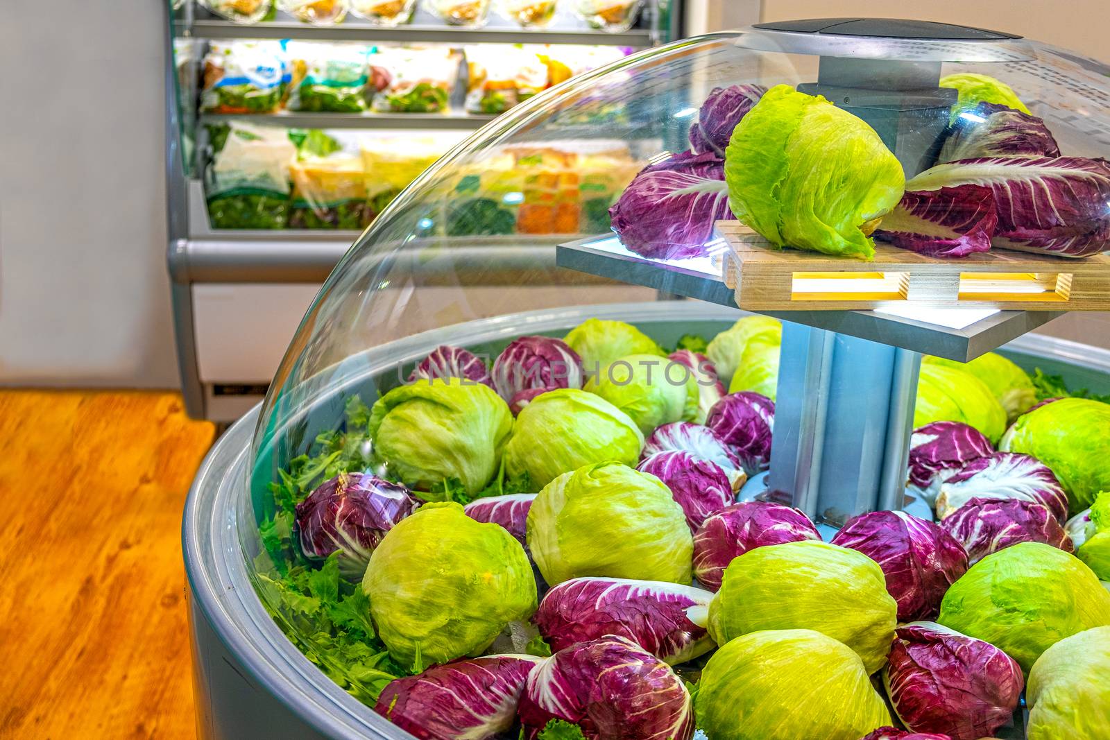 vegetable market refrigerator lettuce salad at supermarket .