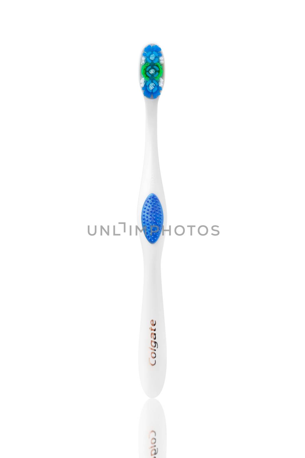 Colgate toothbrush isolated on white background by SlayCer