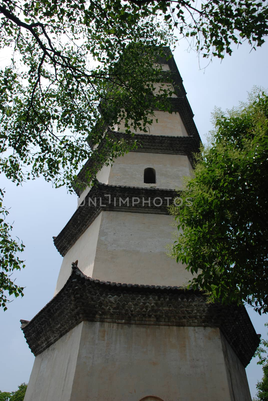 old Chinese tower on the top of the mountain
