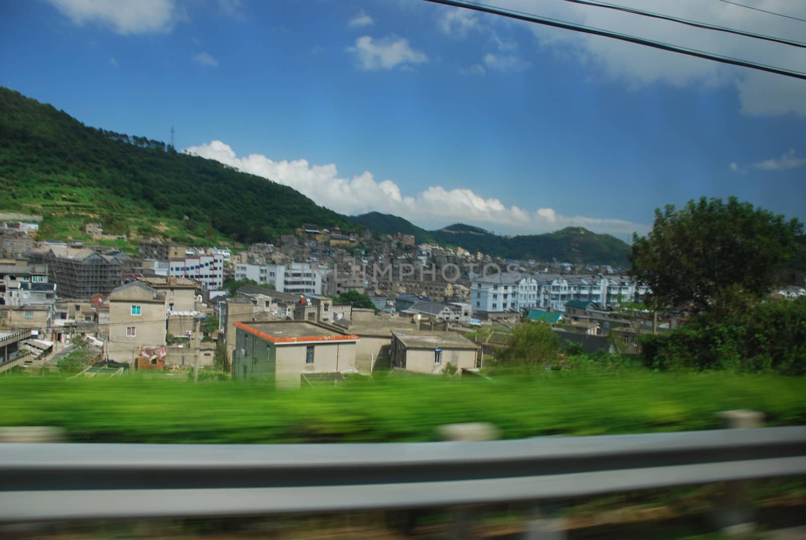 The view from the moving car on the Chinese village