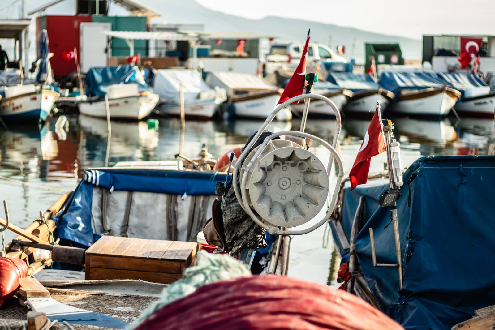 a narrow shoot from a fisherman bay - there is some boats and turkish flags. photo has taken at izmir/turkey.