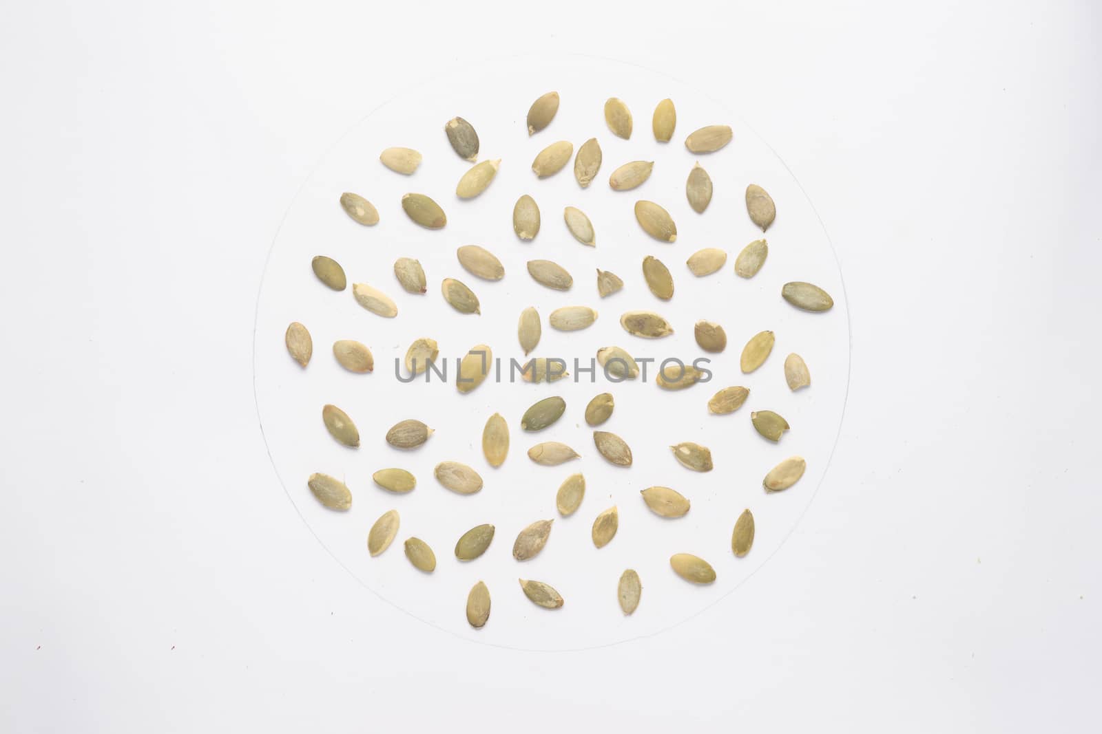 Dry pumpkin seeds isolated on white backgroud. 