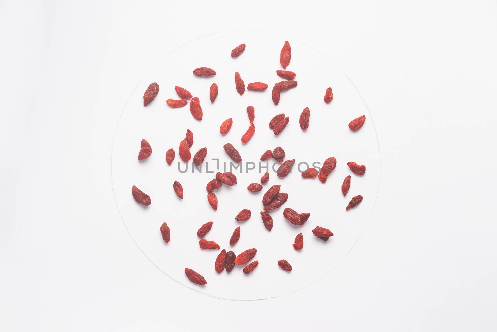 Candied goji berries isolated on white backgroud.  by alexsdriver