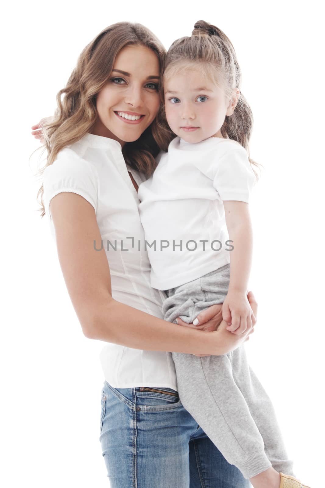 Mother embracing daughter isolated on white background