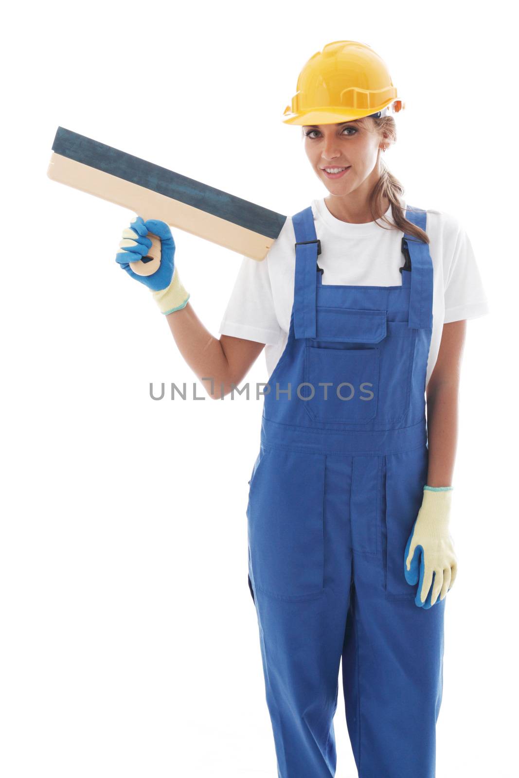 Young beautiful handywoman with masonry trowel isolated on white background