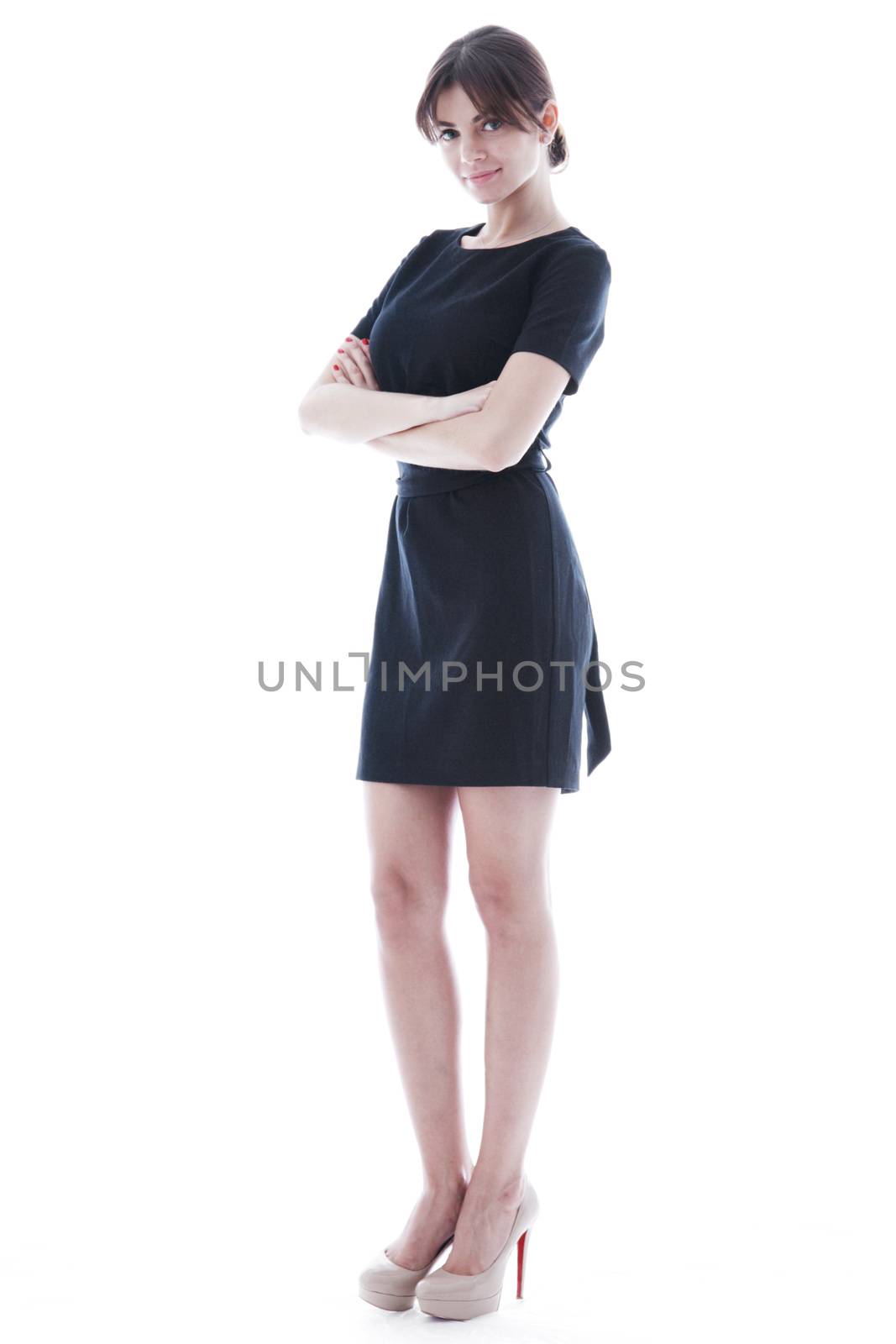 Full body portrait of young business woman in dress isolated on white