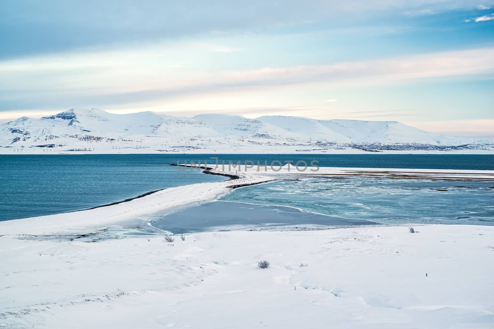View of the Hvalfjordur in winter with the mountains covered by snow, Iceland
